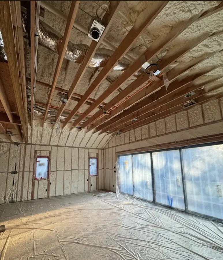 Interior walls and ceiling insulated with spray foam during new construction in Meridian